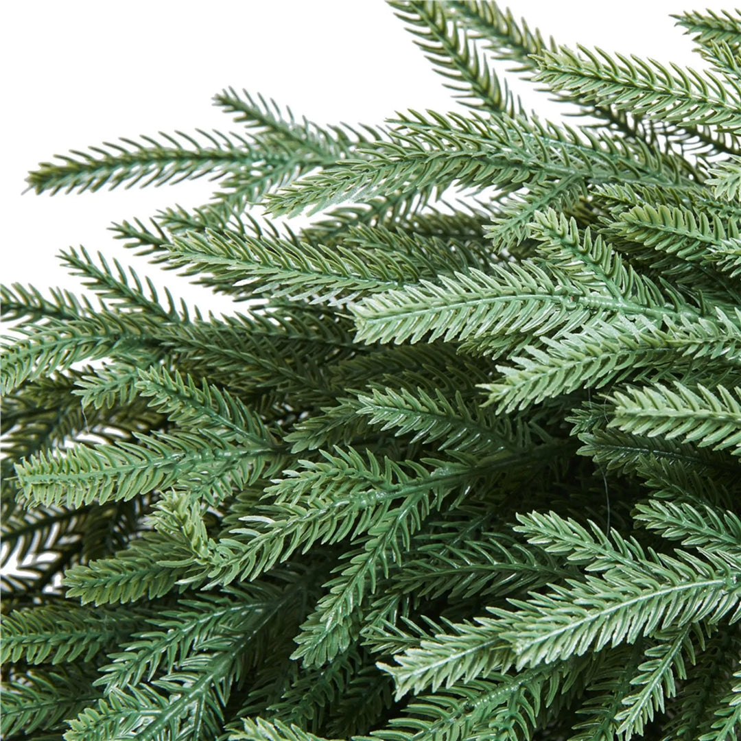 Large green pine wreath on vine base