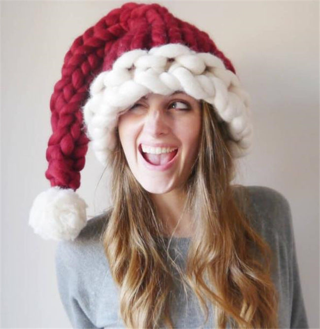 Red chunky knit Christmas hat with white pompom