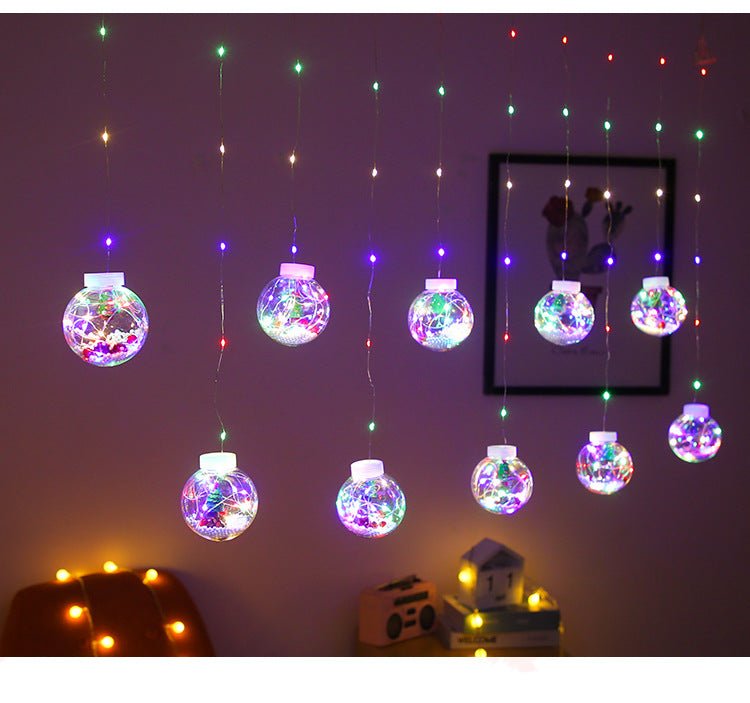 Christmas curtain lights with Santa, present or tree shapes