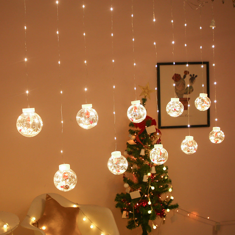 Christmas curtain lights with Santa, present or tree shapes