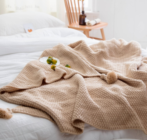 Warmfell Chunky knit throw with pom-pom fringe