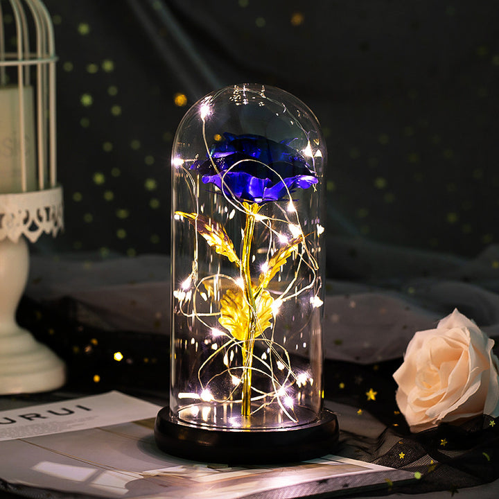 Enchanted rose in a glass dome with LED lights