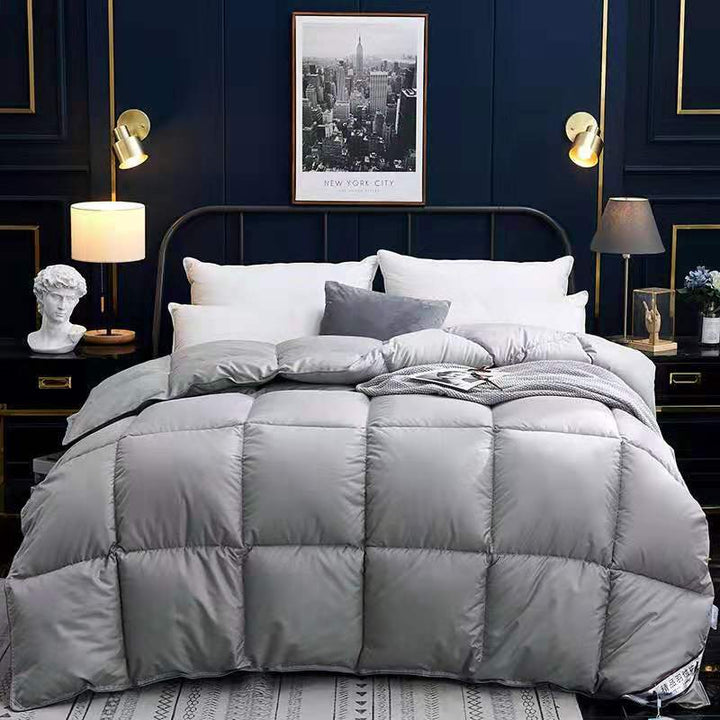 Quilted winter duvet on a bed