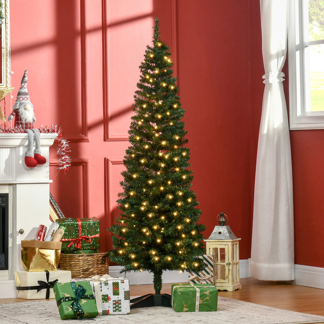 Slim pre-lit pencil Christmas tree in corner