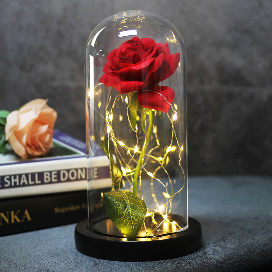 Enchanted rose in a glass dome with LED lights