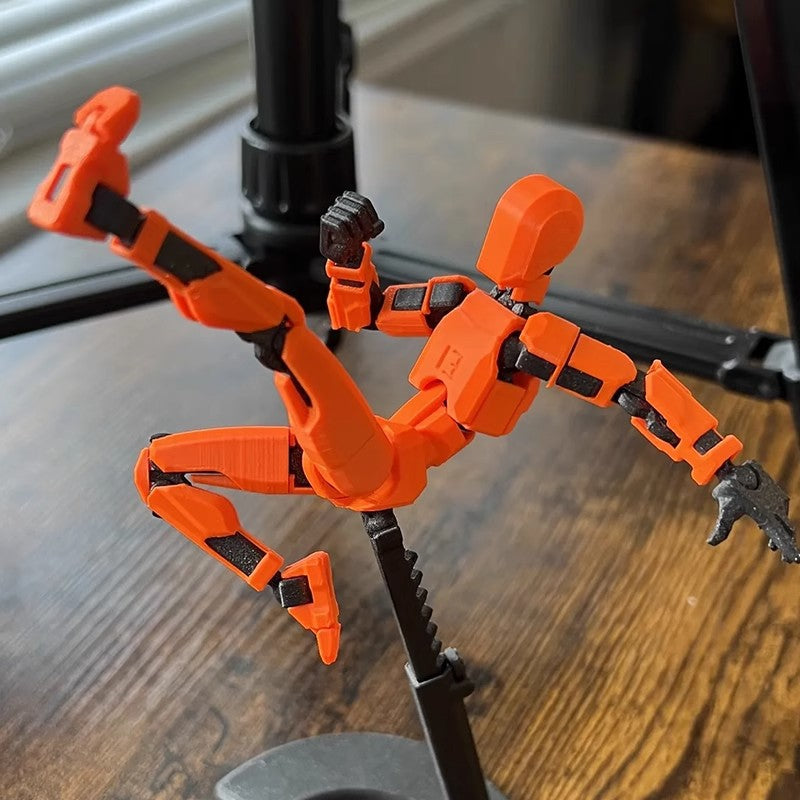 Poseable 3D printed robot figure on desk