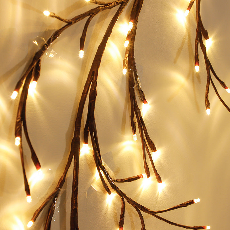 Warm white LED branch light on wall