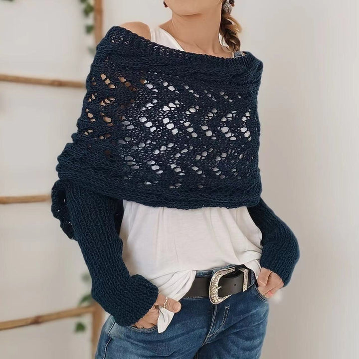 Woman in knitted shrug shawl with sleeves
