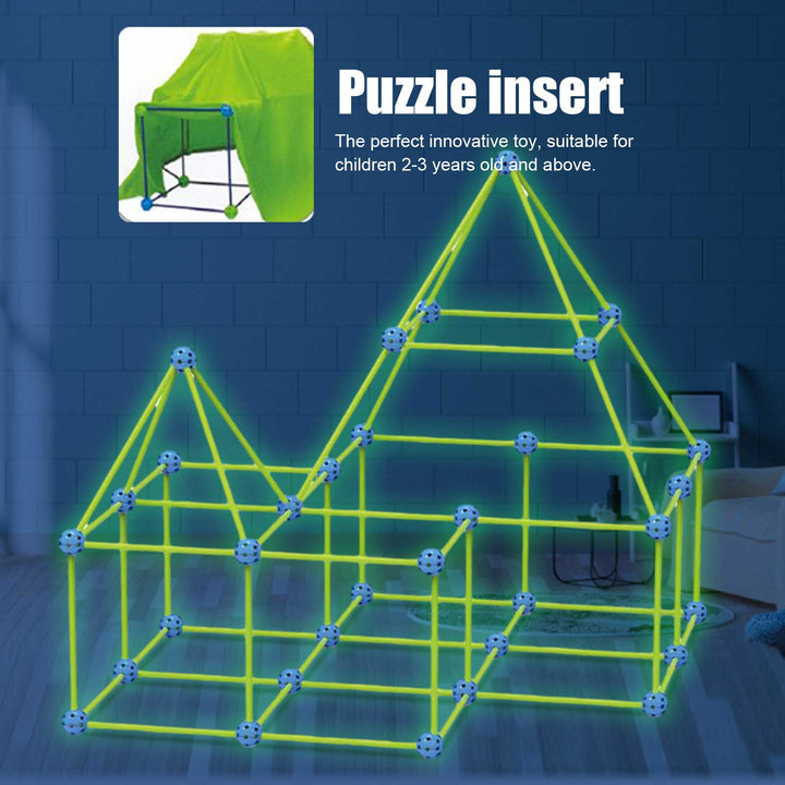 Children building glowing den from sticks