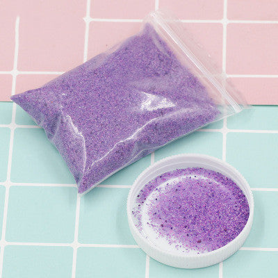 Coloured magic sand shaped underwater