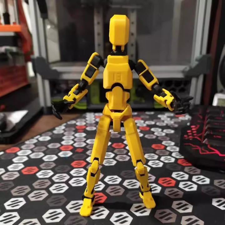 Poseable 3D printed robot figure on desk