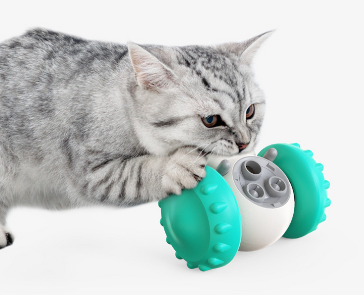 Wobbling robot treat dispensing pet toy