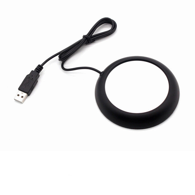 Wood-look USB coaster warming a coffee mug