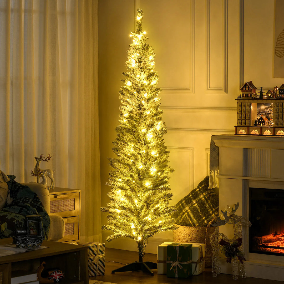 Slim white-flocked pencil tree with warm lights
