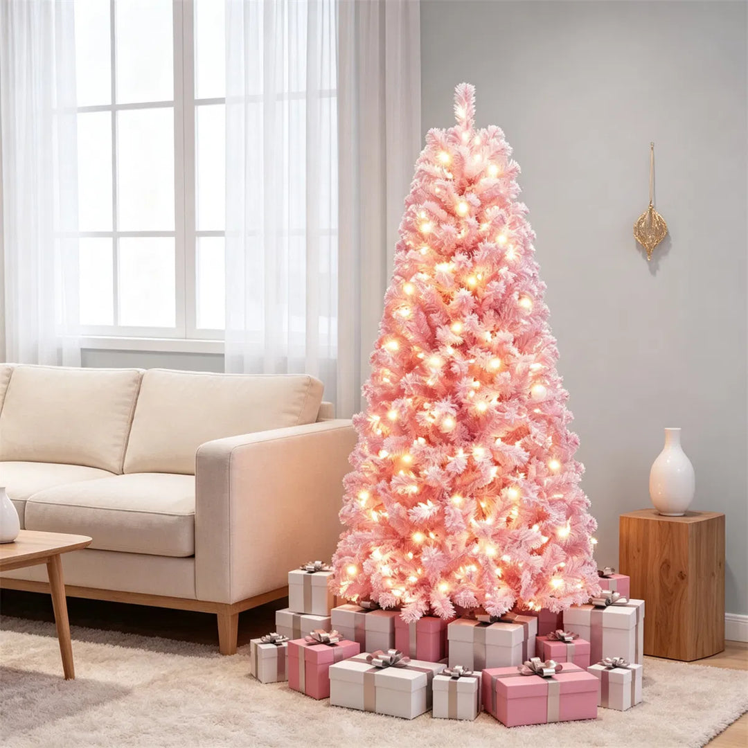 Small pink flocked tree with warm lights