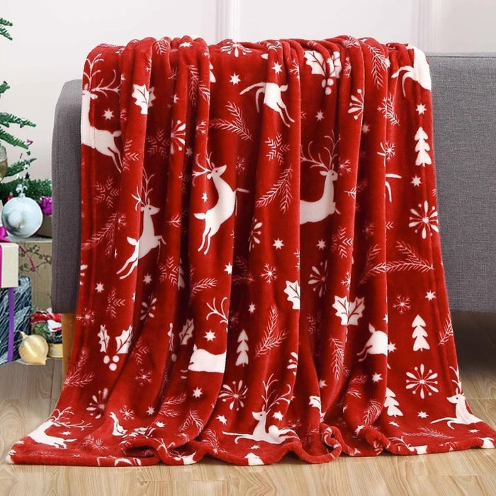 Warmfell Christmas flannel throw with festive prints