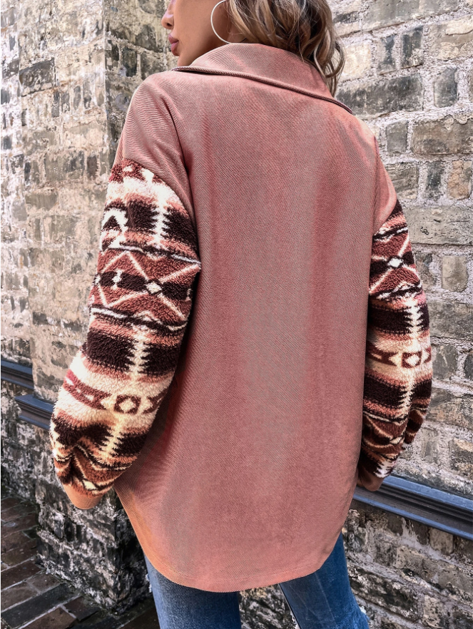 Woman in pink shacket with print sleeves