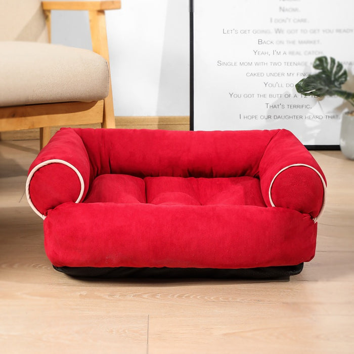 Warmfell Sofa-style pet bed with plush raised bolsters