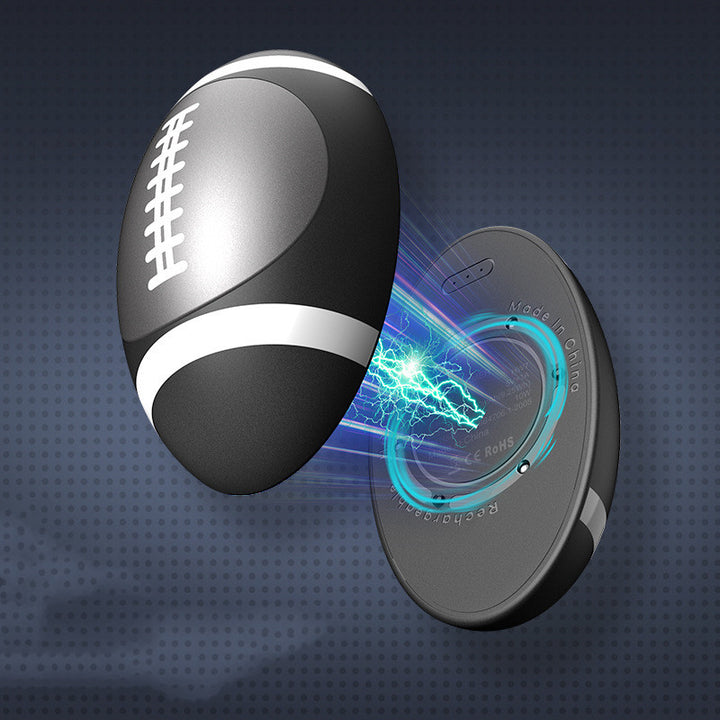 Football-shaped magnetic hand warmer split in two