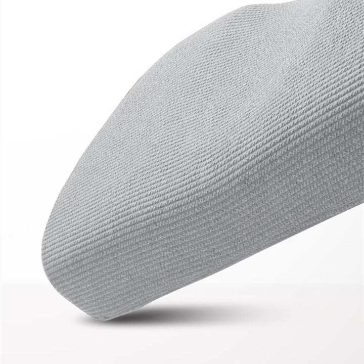 Grey memory foam pillow with knitted cover