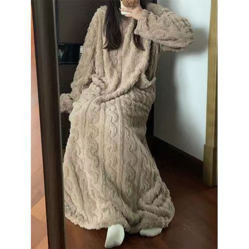 Woman in long pink coral fleece nightgown