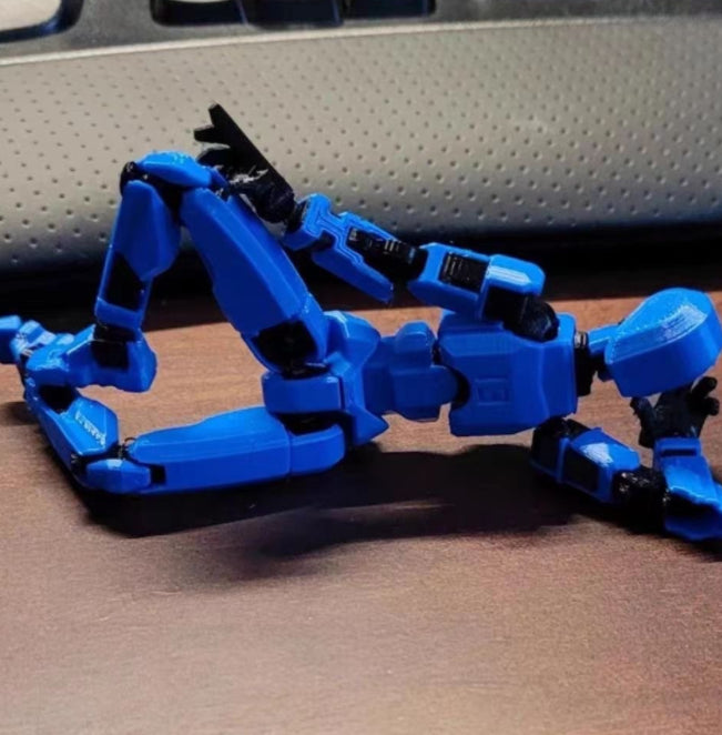 Warmfell 3D-printed poseable robot figure with accessories
