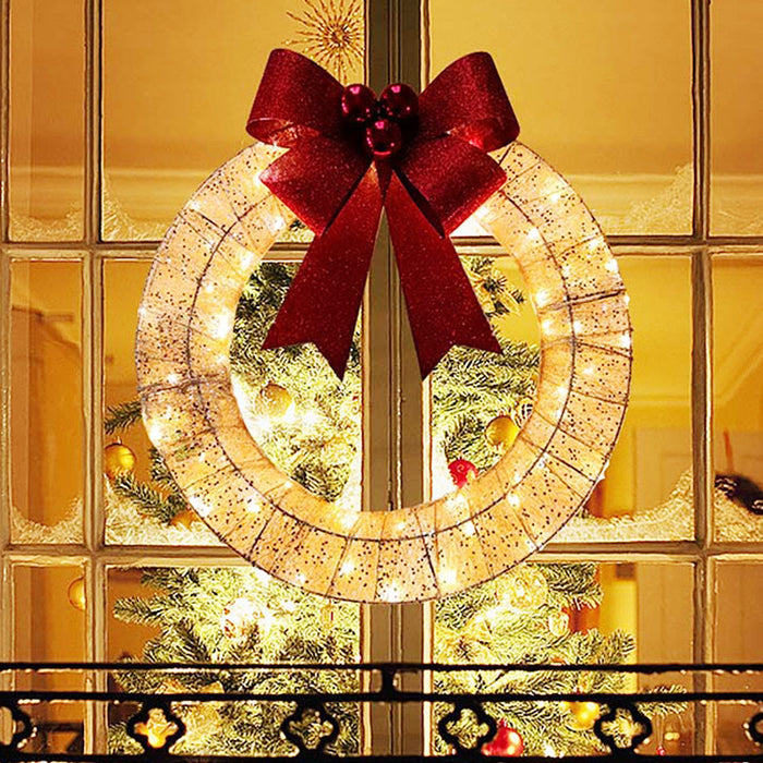 Warmfell 50 cm light-up Christmas wreath with warm LEDs and big bow