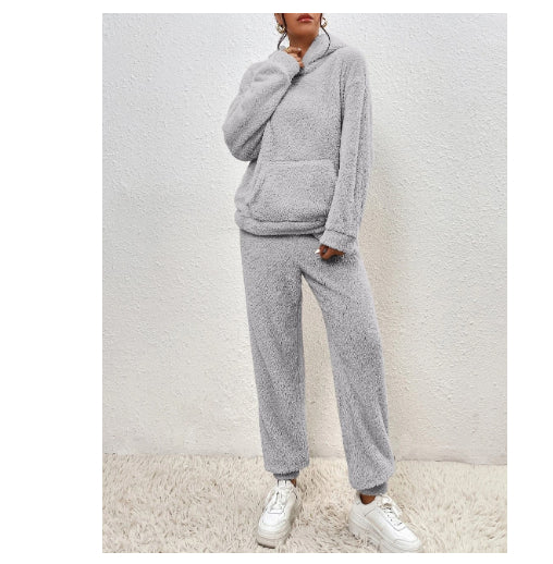 Woman in fluffy teddy hoodie and trousers