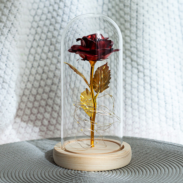 Enchanted rose in a glass dome with LED lights