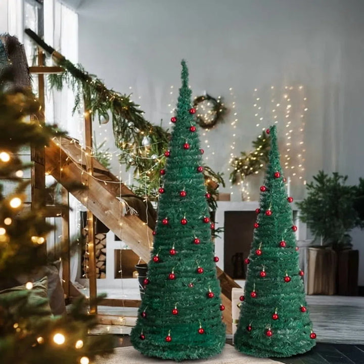 Two pop-up trees with red baubles