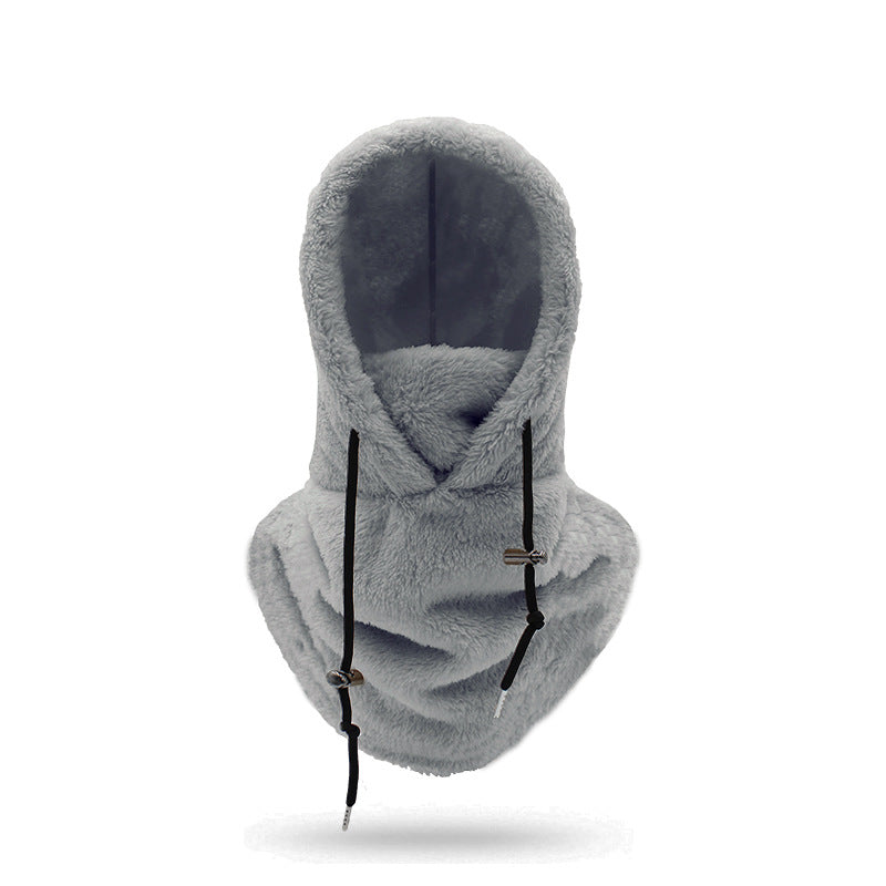 Woman wearing beige plush hood with scarf