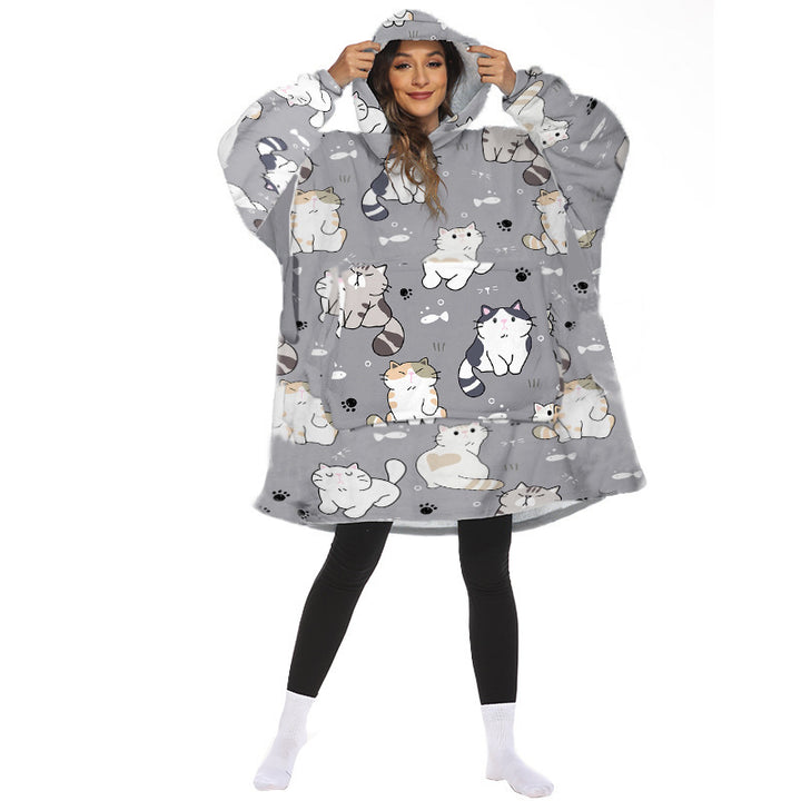 Person wearing oversized panda hooded blanket