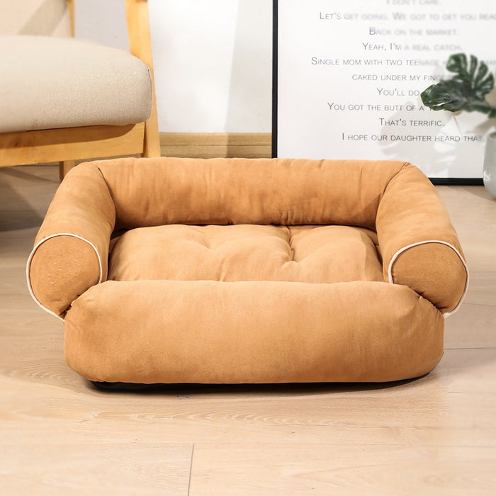 Warmfell Sofa-style pet bed with plush raised bolsters