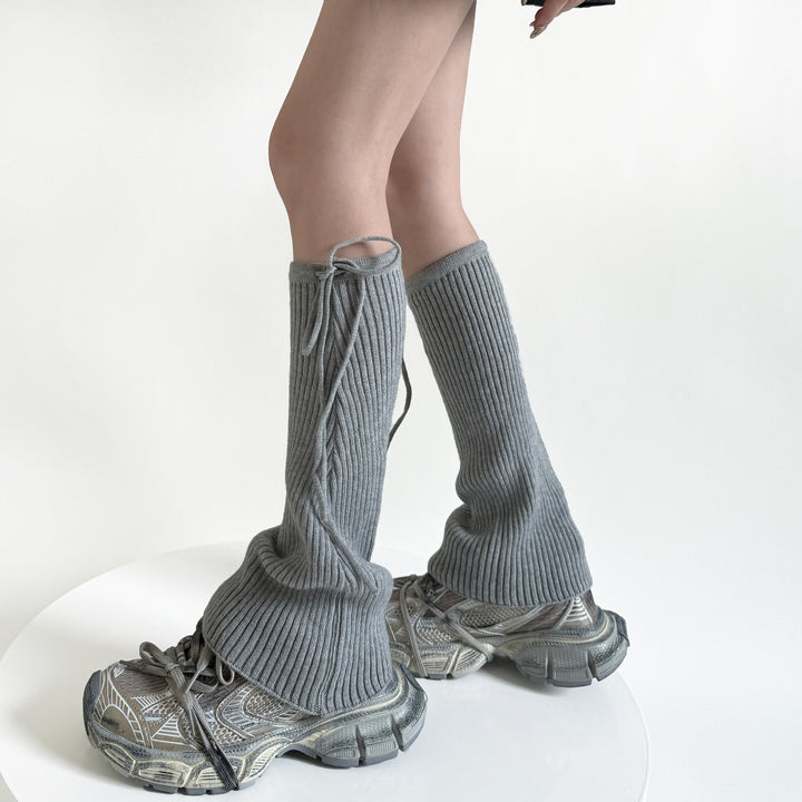 Pink flared ribbed leg warmers with tie