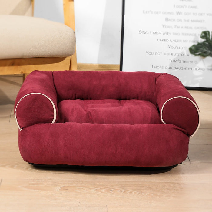 Warmfell Sofa-style pet bed with plush raised bolsters