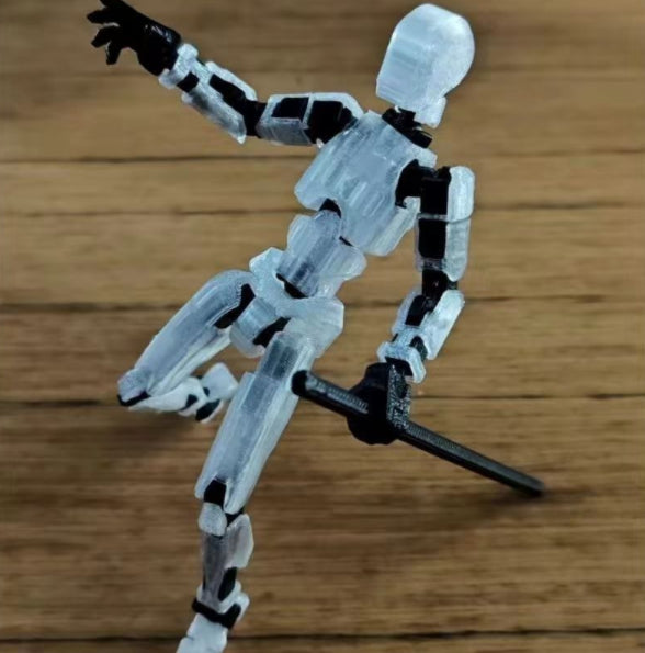 Poseable 3D printed robot figure on desk