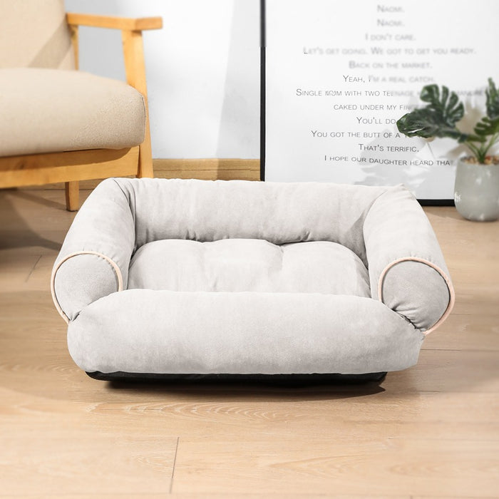 Warmfell Sofa-style pet bed with plush raised bolsters