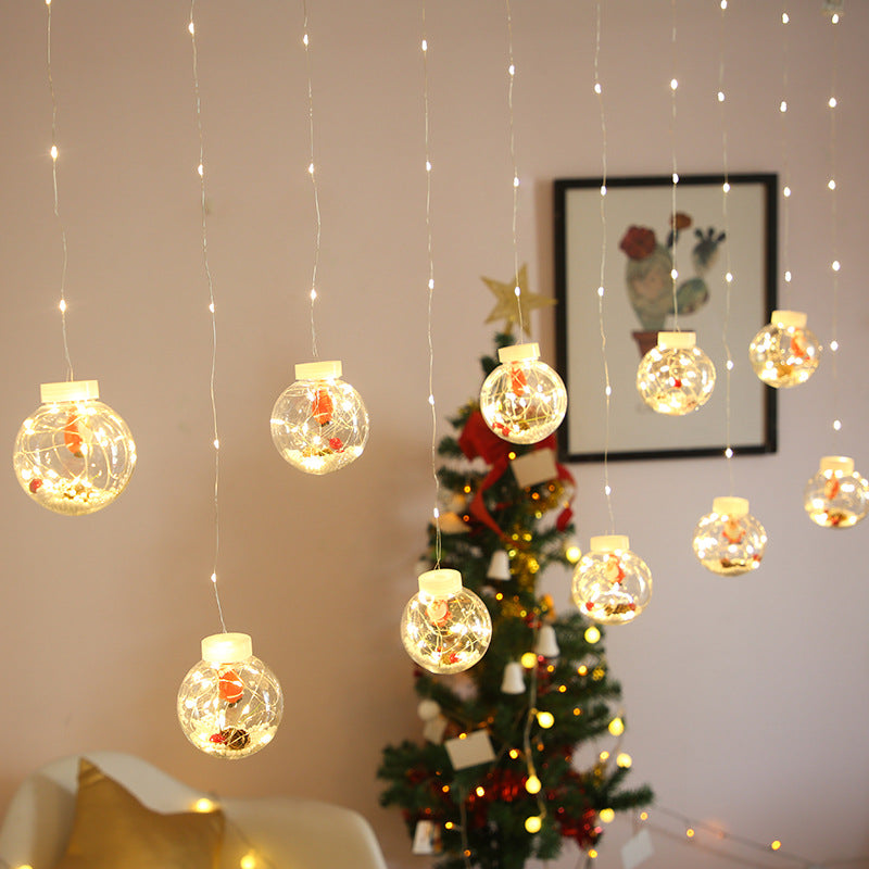 Christmas curtain lights with Santa, present or tree shapes