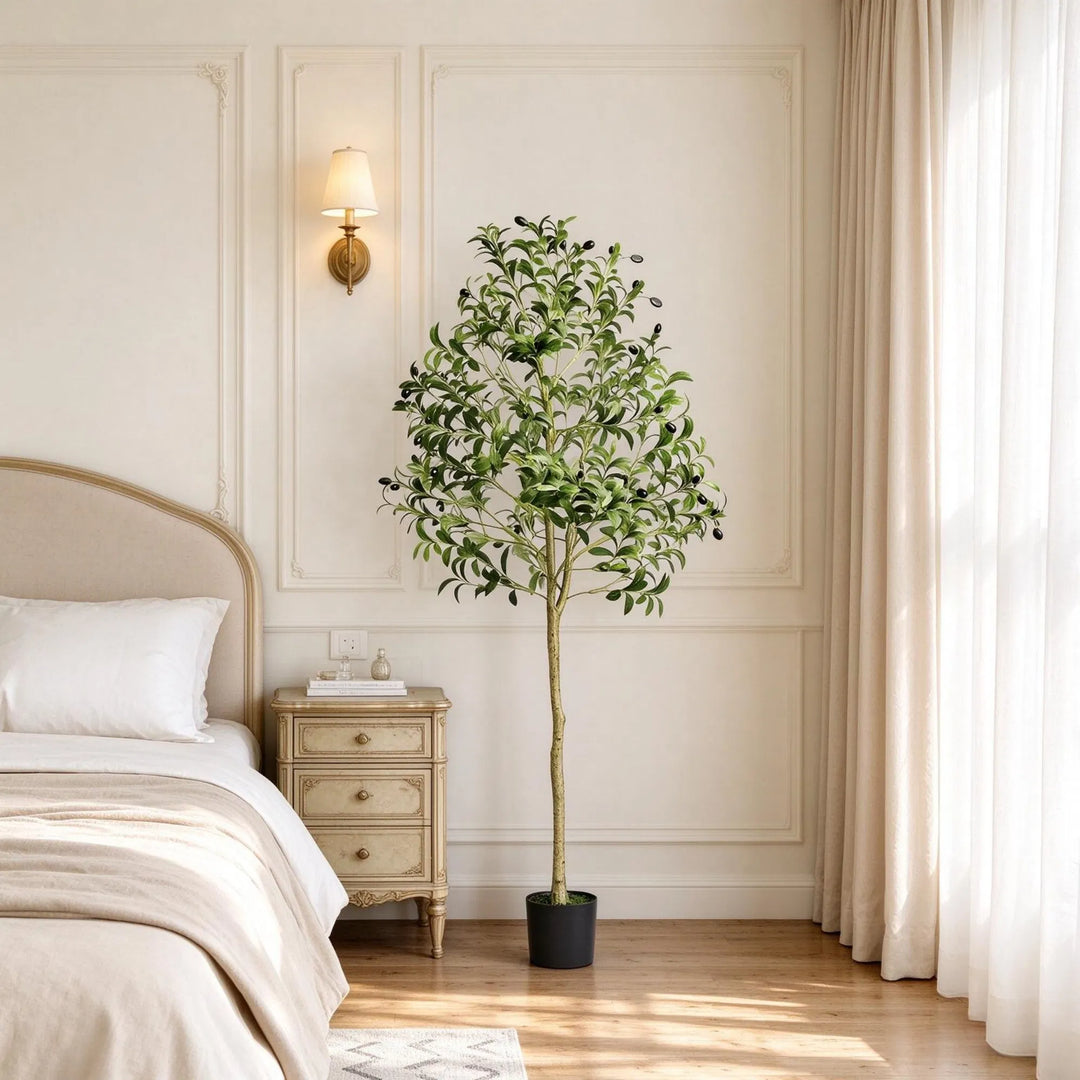 Tall artificial olive tree in black pot