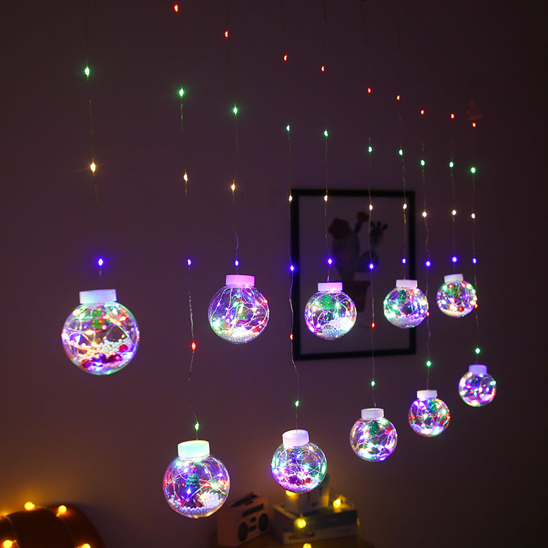 Christmas curtain lights with Santa, present or tree shapes