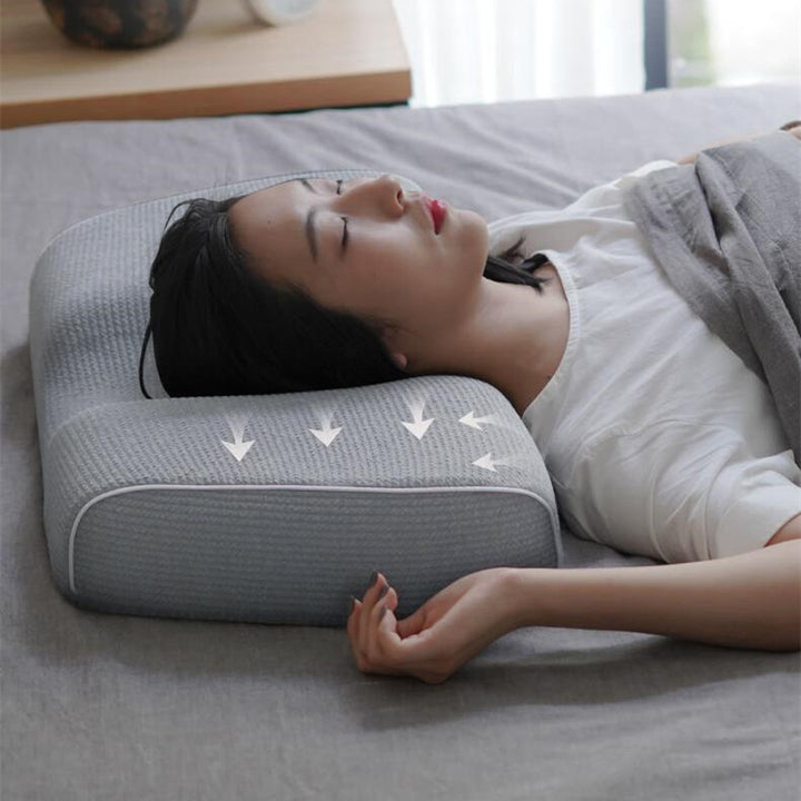 Grey memory foam pillow with knitted cover