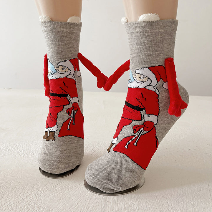 Christmas socks with magnetic hands linked