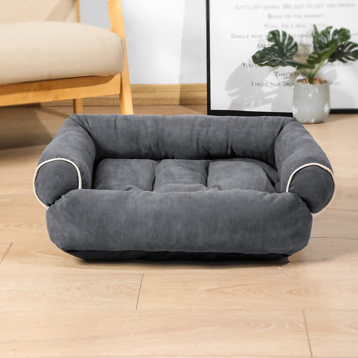 Warmfell Sofa-style pet bed with plush raised bolsters