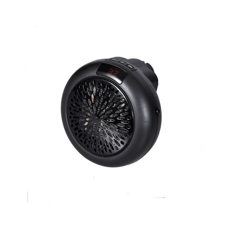 Compact white heater plugged into wall socket