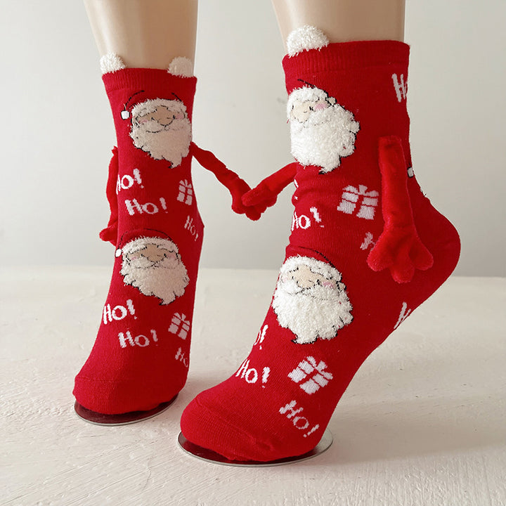 Christmas socks with magnetic hands linked