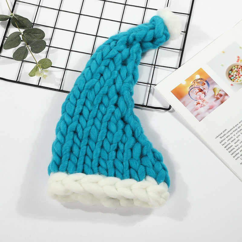 Red chunky knit Christmas hat with white pompom