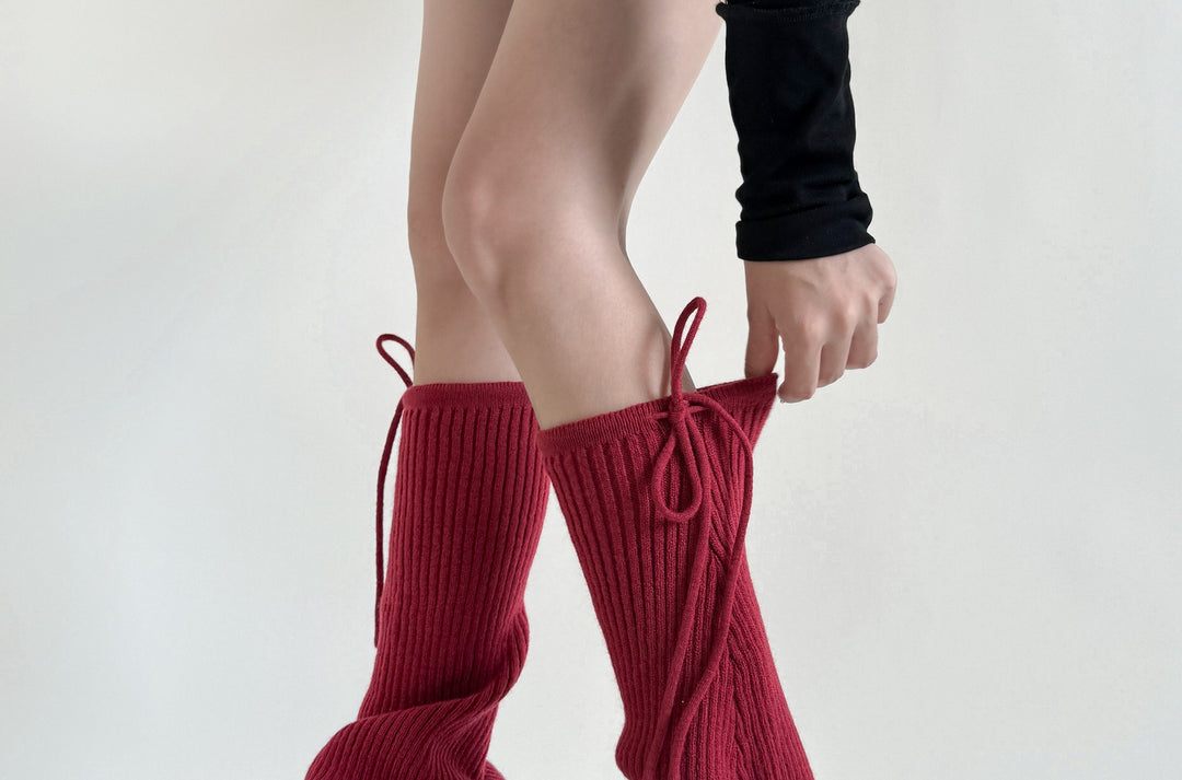 Pink flared ribbed leg warmers with tie