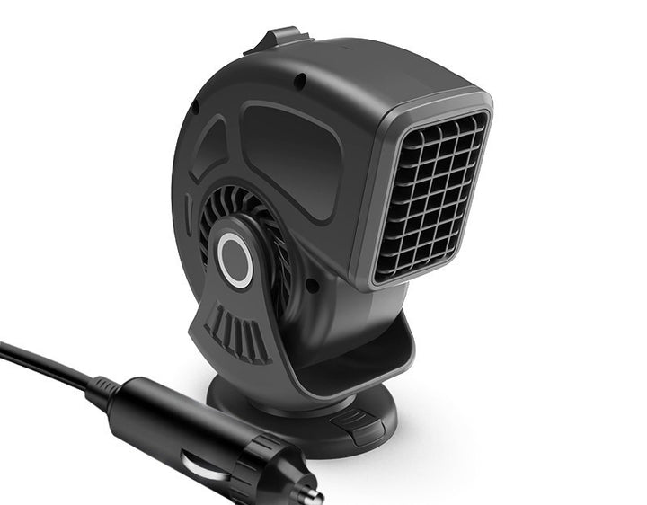Black portable car heater on dashboard