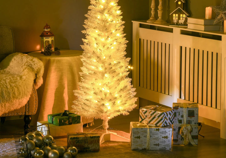 Small white pencil tree with warm lights