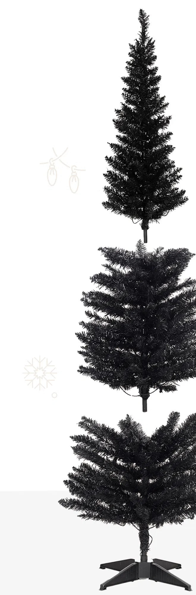 Black pencil Christmas tree with warm lights